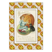 L'enfant découpe un citrouille carte de vœux