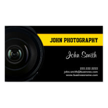 Lentille et carte de visite jaune de photographie 