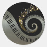 Les clés de piano et les notes de musique d'or arg