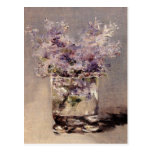 Les lilas de Manet dans un verre - carte postale