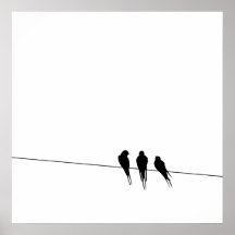 Les merles silhouettent sur le fil posters