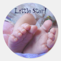 Les pieds de bébé botte le nouveau bébé d'autocoll
