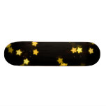 L'ÉTOILE JAUNE FORME DES LUMIÈRES DE BOKEH BROUILL PLANCHES À ROULETTES CUSTOMISÉES