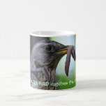 L'oiseau tôt attrape la tasse de ver