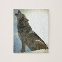 Loup hurlant dans la neige puzzle avec photo