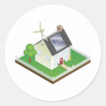 Maison viable d'énergie renouvelable adhésif rond
