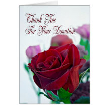 Merci pour la carte de donation avec un rose rouge