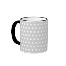 Modèle de point gris-clair et blanc de polka tasse