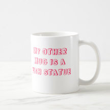 MON AUTRE TASSE EST UNE STATUE DE POISSONS