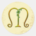 Monogramme irlandais M d'or Autocollant Rond