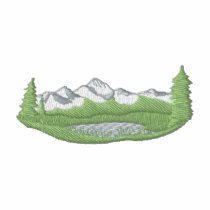 Montagnes avec des arbres polos brodés