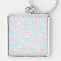 Motif de rose de rose en pastel sur bleu-clair. porte-clé