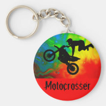 Motocrossing dans éruption porte-clé
