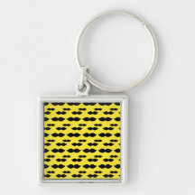 Moustache, guidon noir sur l'arrière - plan jaune porte-clé