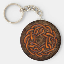 Noeud celtique orange lumineux sur le cuir porte-clefs