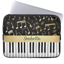 Noir et or de notes musicales et de clés de piano housses ordinateur