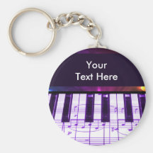 Notes colorées de clavier et de musique de piano à porte-clés