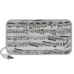 Notes musicales noires et blanches haut-parleurs
