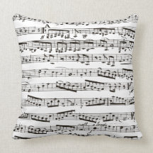 Notes musicales noires et blanches oreillers