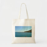 Océan contre le ciel bleu sacs fourre-tout