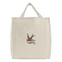 Oiseau de tatouage avec le sac brodé par bannière 
