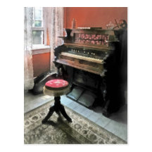 Organe avec des selles de petit point carte postale