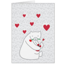 Ours blanc mignon jouant la carte d'amour d'Uke
