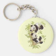 Panda jouant dans un arbre porte-clé