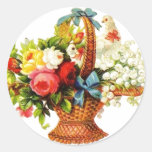 Panier avec les fleurs et la colombe adhésif rond
