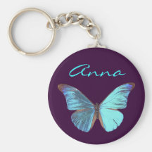 Papillon bleu assez iridescent porte-clés