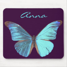 Papillon bleu assez iridescent tapis de souris