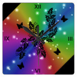 papillon et étoiles noirs sur l'arc-en-ciel