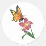 Papillon et fleur autocollants ronds