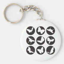 Papillons noirs et blancs porte-clef