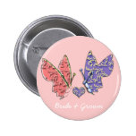 Papillons roses et bleus de jeune mariée et de mar badges avec agrafe