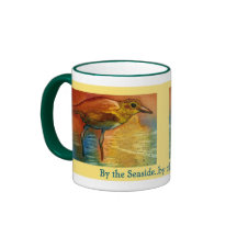 Par la tasse d'oiseau de mer de bord de la mer
