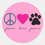 Pattes d'amour de paix autocollants ronds