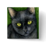 Pénélope le bouton chanceux de chat noir