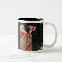 père Noël dans la tasse de cheminée
