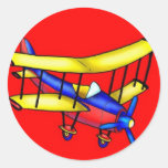 Petit avion adhésif rond