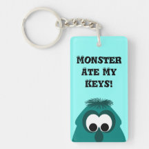 Petit monstre cyan foncé idiot porte-clef