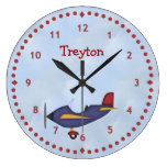 Peu d'horloge murale bleue d'avion