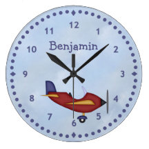 Peu d'horloge murale rouge d'avion