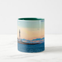 Phare à la tasse de coucher du soleil