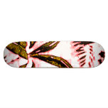 Planche à roulettes rose de paume