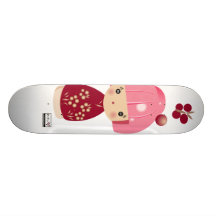 Planche à roulettes rose de triplet de Kokeshi