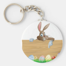 Pointage de caractère de lapin et oeufs de pâques porte-clefs