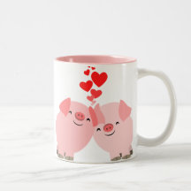 Porcs mignons de bande dessinée dans la tasse d'am