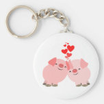 Porcs mignons de bande dessinée dans l'amour Keych porte-clés