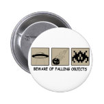 Prenez garde du bouton en baisse d'objets badge